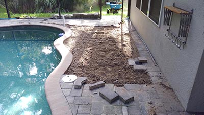 Paver repair in progress