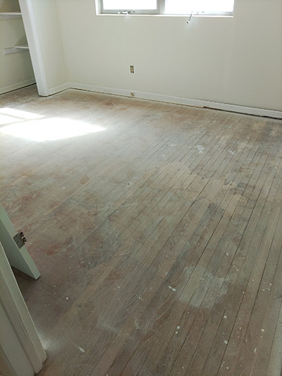 Wood Floor Has Stains & Lippage 